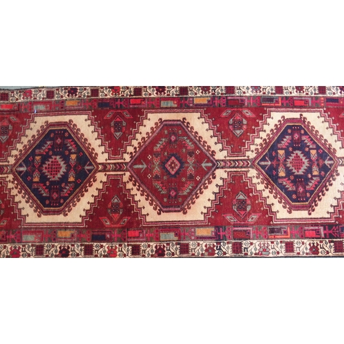 870 - A red ground Azerbaijan runner