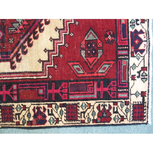 870 - A red ground Azerbaijan runner