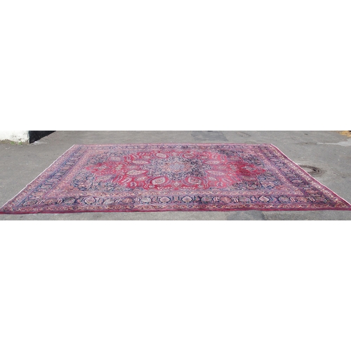 871 - A red ground Safi Ali Shah rug