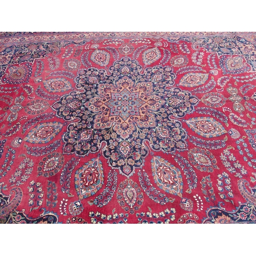 871 - A red ground Safi Ali Shah rug