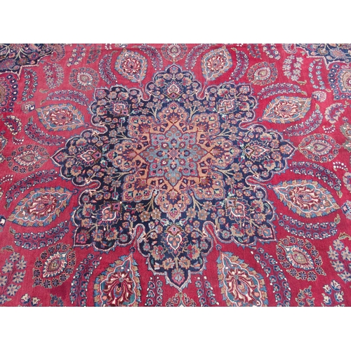 871 - A red ground Safi Ali Shah rug