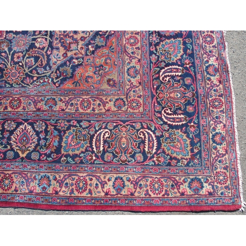 871 - A red ground Safi Ali Shah rug