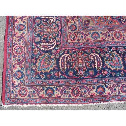 871 - A red ground Safi Ali Shah rug