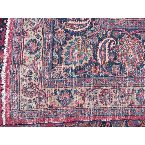 871 - A red ground Safi Ali Shah rug