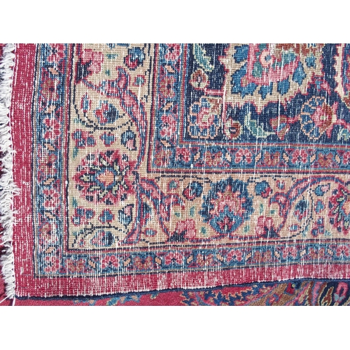 871 - A red ground Safi Ali Shah rug