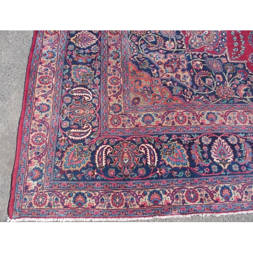 871 - A red ground Safi Ali Shah rug