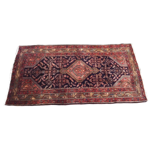 875 - A blue ground Hamadan rug