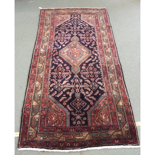 875 - A blue ground Hamadan rug