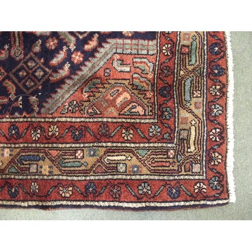 875 - A blue ground Hamadan rug