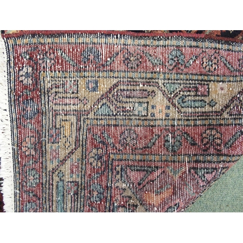 875 - A blue ground Hamadan rug