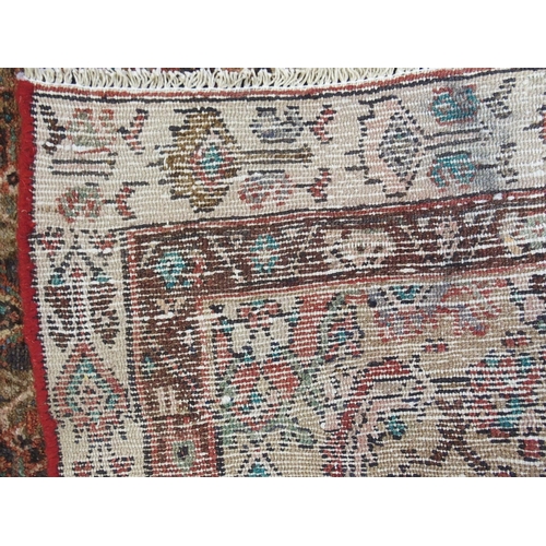 876 - A brown ground Hamadan runner