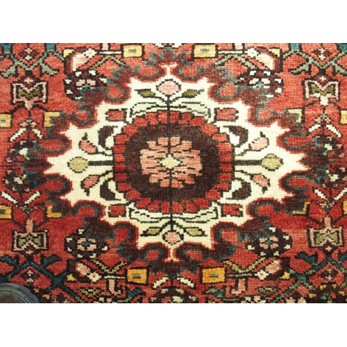 879 - A Terracotta ground Hamadan runner