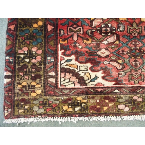 879 - A Terracotta ground Hamadan runner