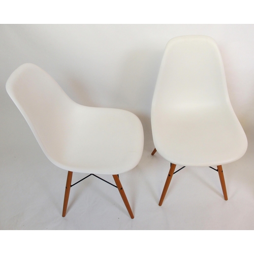 883 - Three Vitra Eames white Plastic Side Chairs DSW