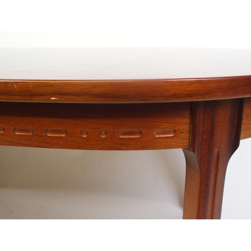 885 - Nils Jonsson (Swedish 20th Century) A rosewood dining table