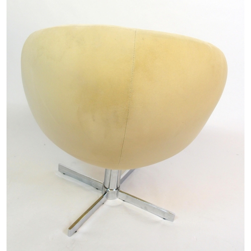 886 - A 20th Century swivel egg chair