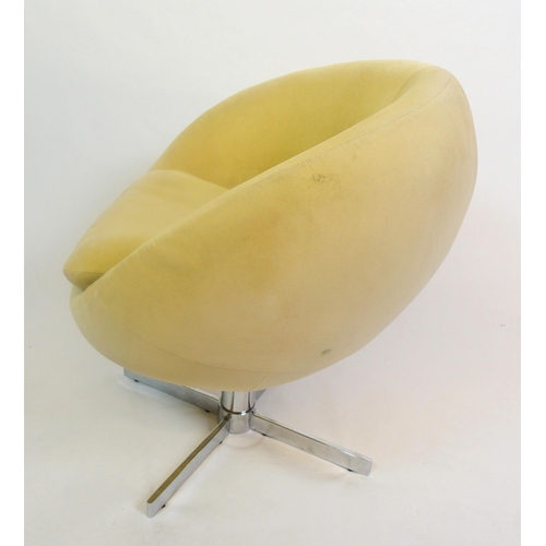 886 - A 20th Century swivel egg chair