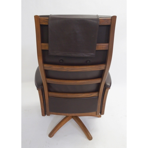 888 - An Ercol brown leather golden dawn Gina recliner chair