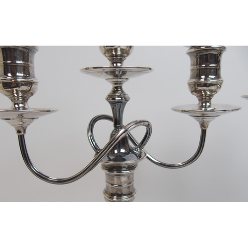 152 - A pair of early 20th Century silver candelabra