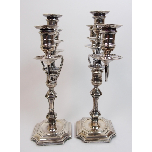 152 - A pair of early 20th Century silver candelabra