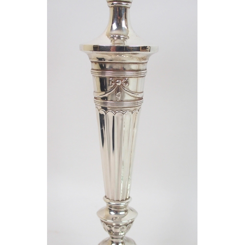 163 - A pair of late Victorian silver candlesticks