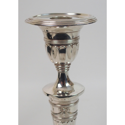 163 - A pair of late Victorian silver candlesticks