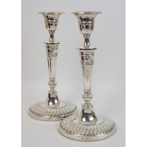 163 - A pair of late Victorian silver candlesticks