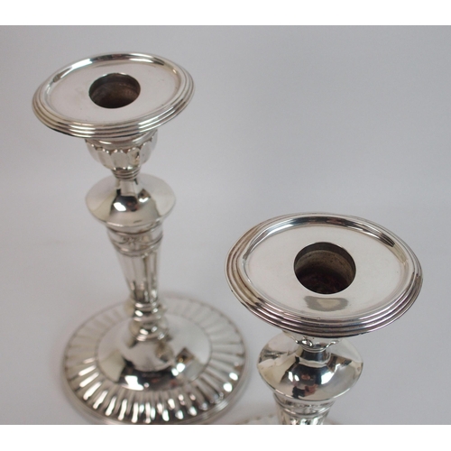 163 - A pair of late Victorian silver candlesticks