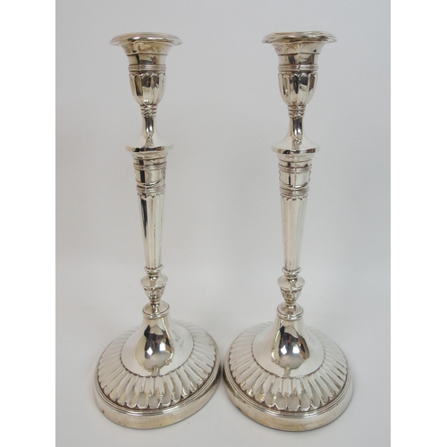 163 - A pair of late Victorian silver candlesticks