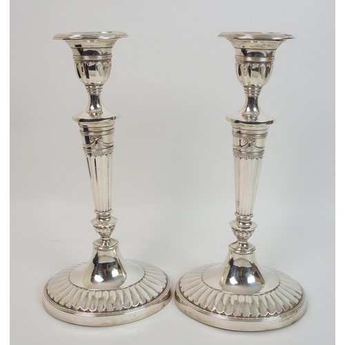 163 - A pair of late Victorian silver candlesticks