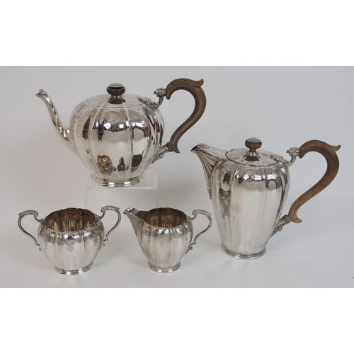 166 - A four piece silver tea service