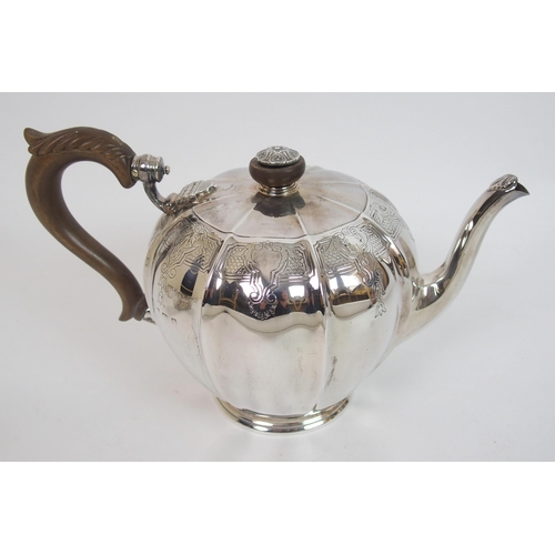 166 - A four piece silver tea service