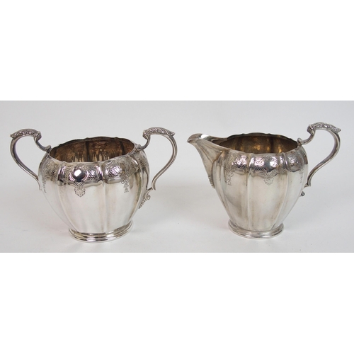 166 - A four piece silver tea service