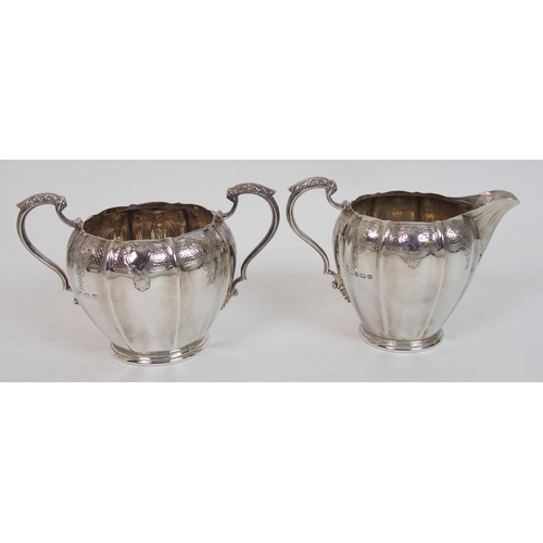 166 - A four piece silver tea service