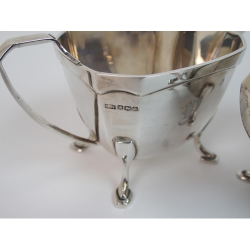 169 - A three piece silver tea service