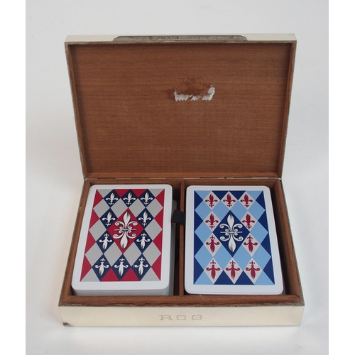 174 - A pair of sterling silver cigarette boxes