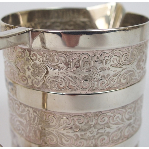 183 - A silver christening mug