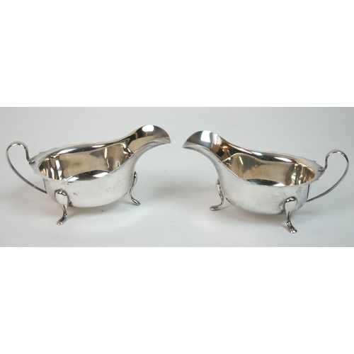 186 - A pair of silver sauceboats