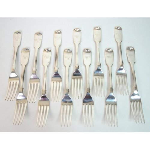 187 - A matched part suite of silver cutlery