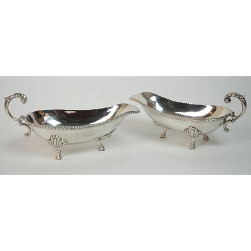 188 - A pair of sterling silver sauceboats