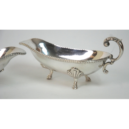 188 - A pair of sterling silver sauceboats