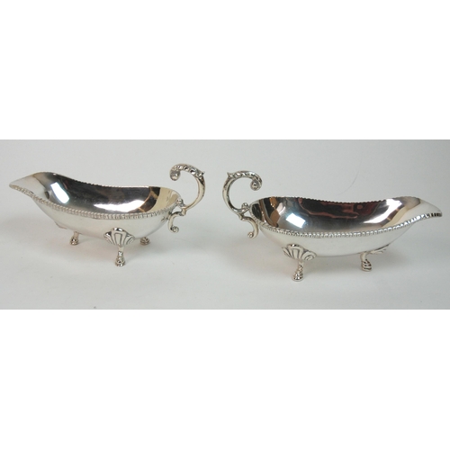 188 - A pair of sterling silver sauceboats