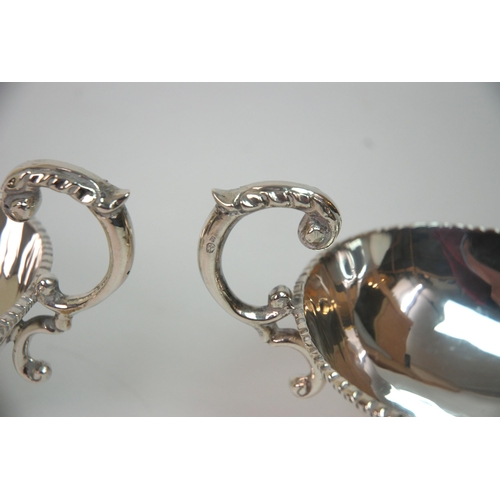 188 - A pair of sterling silver sauceboats