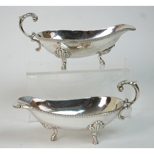 188 - A pair of sterling silver sauceboats