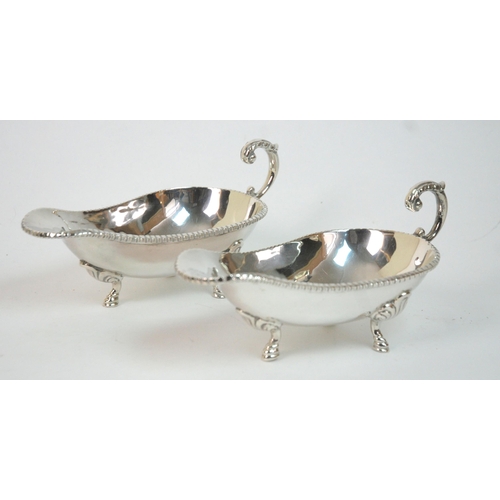 188 - A pair of sterling silver sauceboats