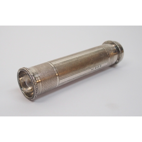 191 - A silver cased pocket torch