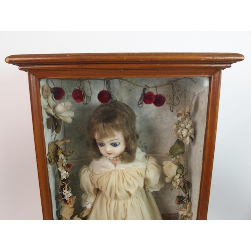 316 - An early wax over doll