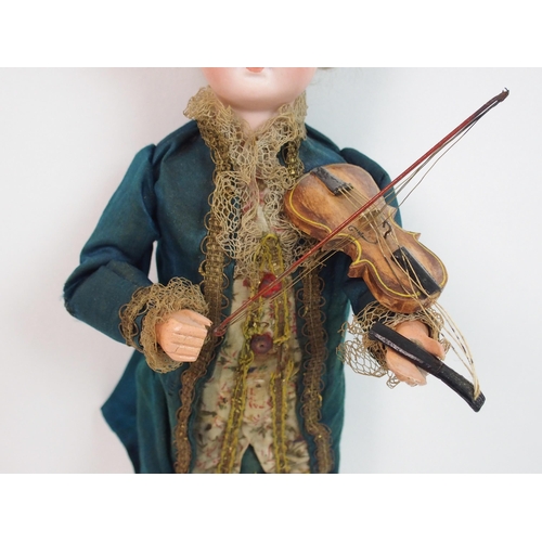 317 - A Continental bisque-headed automaton violin playing doll