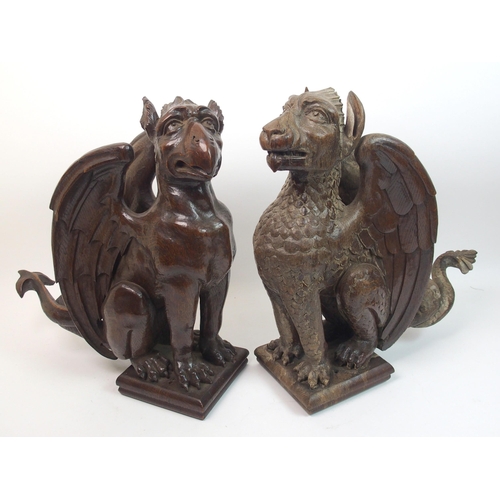 330 - Two Victorian oak carved griffins