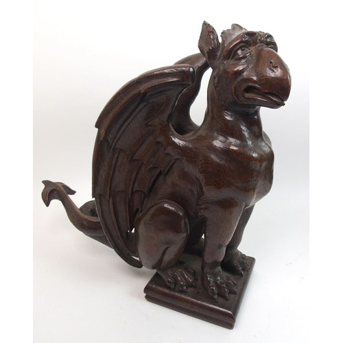 330 - Two Victorian oak carved griffins